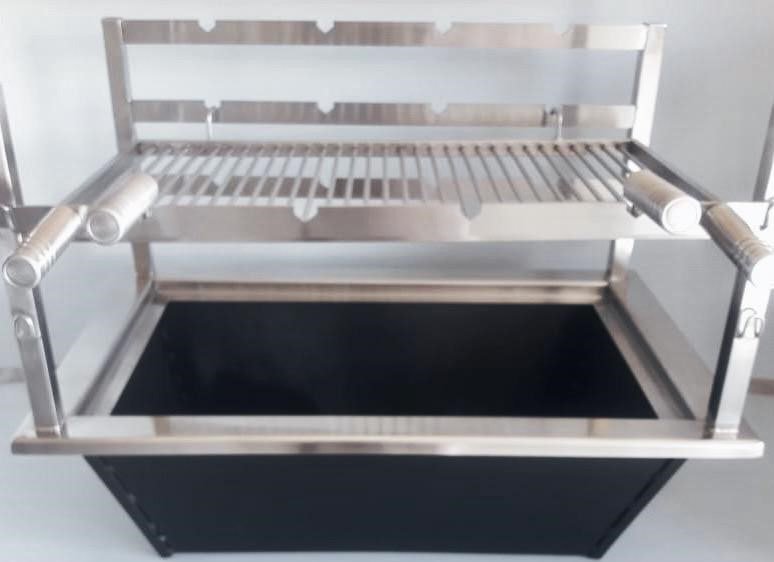 Churrasqueira cooktop em aço inox instalada em bancada